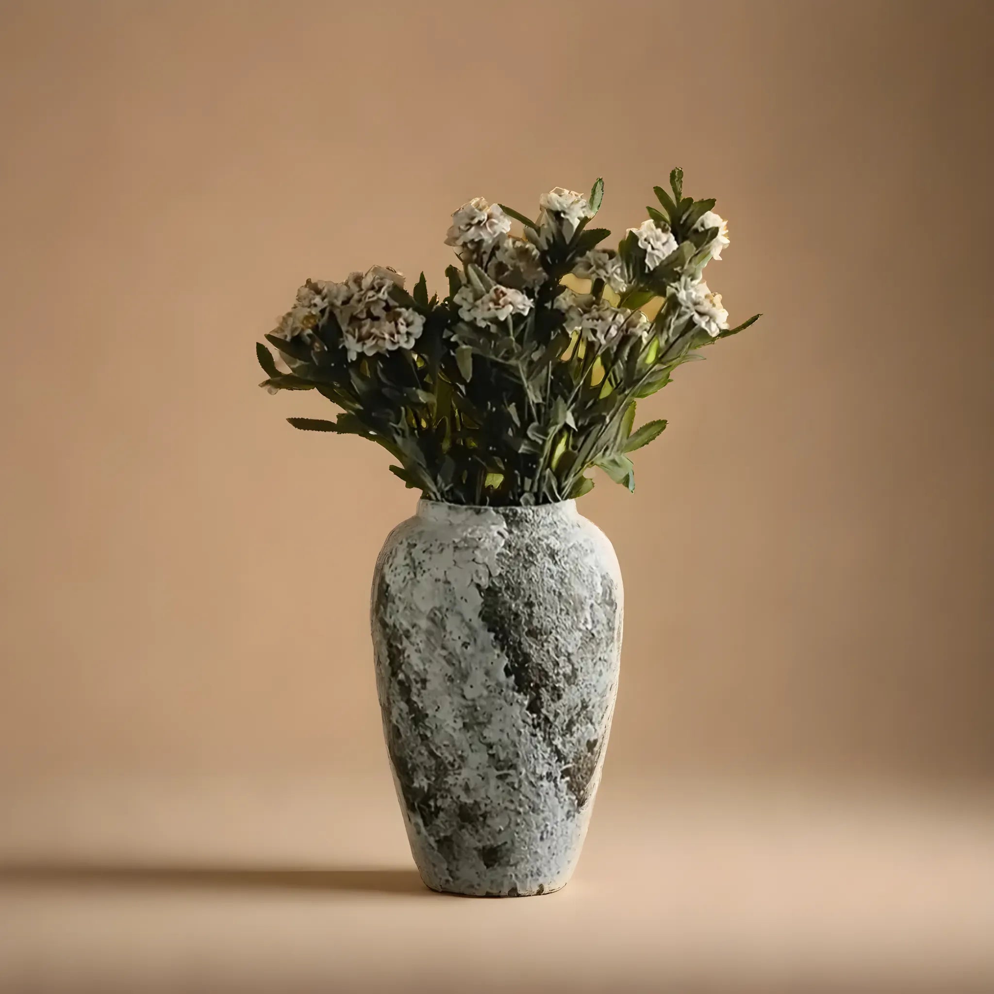 A rustic ceramic vase from the Andes with an earthy, textured finish, blending natural tones for a timeless, handcrafted look.