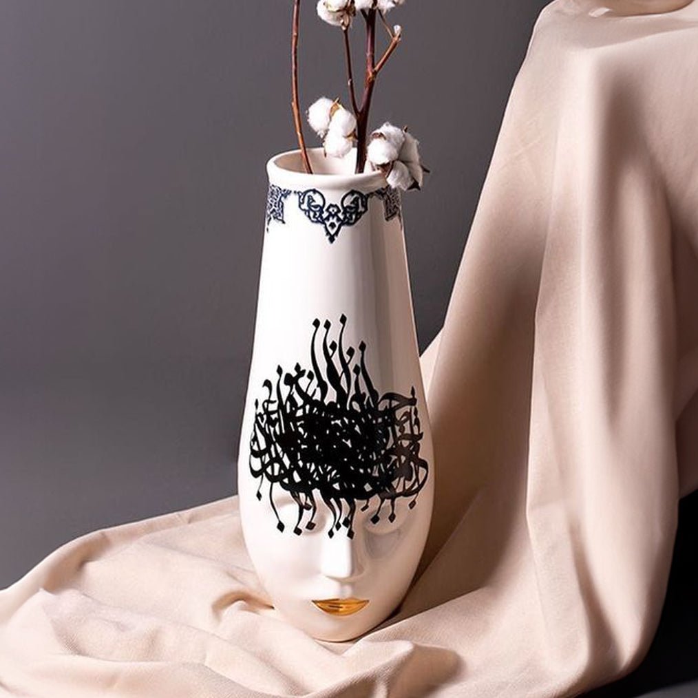 Banu artisanal vase with handcrafted details and a unique design, showcasing intricate craftsmanship and adding a rustic yet elegant touch to any space.