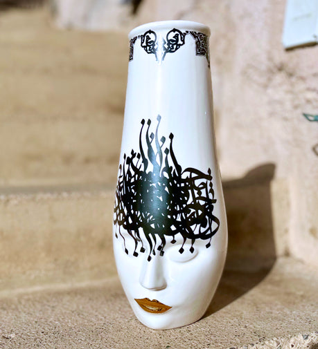 Banu artisanal vase with handcrafted details and a unique design, showcasing intricate craftsmanship and adding a rustic yet elegant touch to any space.