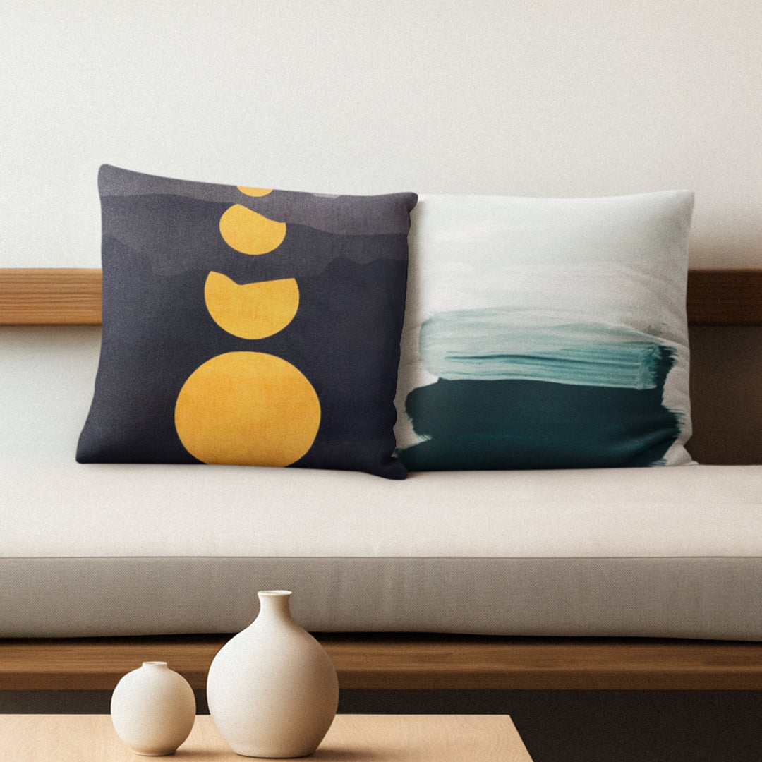 Set of two decorative cushions with fillers, featuring the Whisp and Moonscape designs, crafted from soft, high-quality fabric for a stylish and cozy touch.