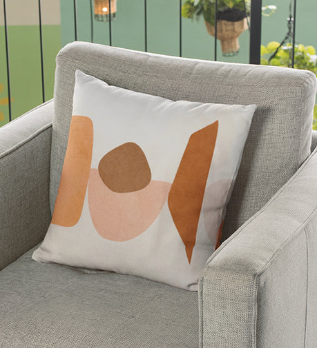 Set of two decorative cushions with fillers, featuring Earthen Hues and Quietude designs, made from soft, premium fabric with calming colors and textures for a serene and cozy ambiance.