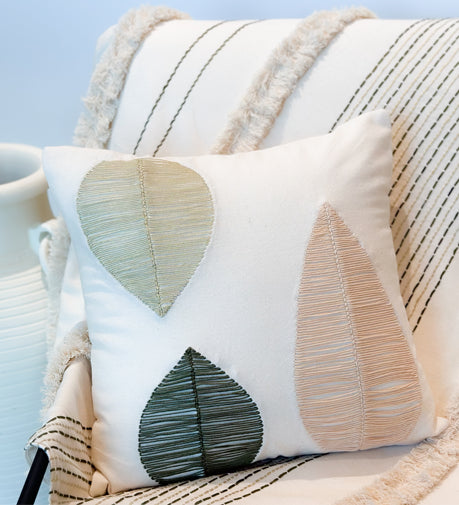 Enchant Hand Woven Cushion featuring delicate craftsmanship and an elegant, textured design.