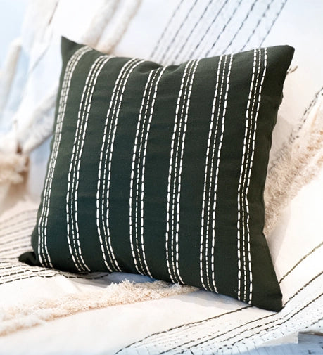 Enchanted Hand Woven Cushion with intricate weaving and a magical, textured design.