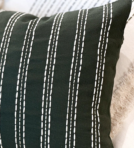 Enchanted Hand Woven Cushion with intricate weaving and a magical, textured design.