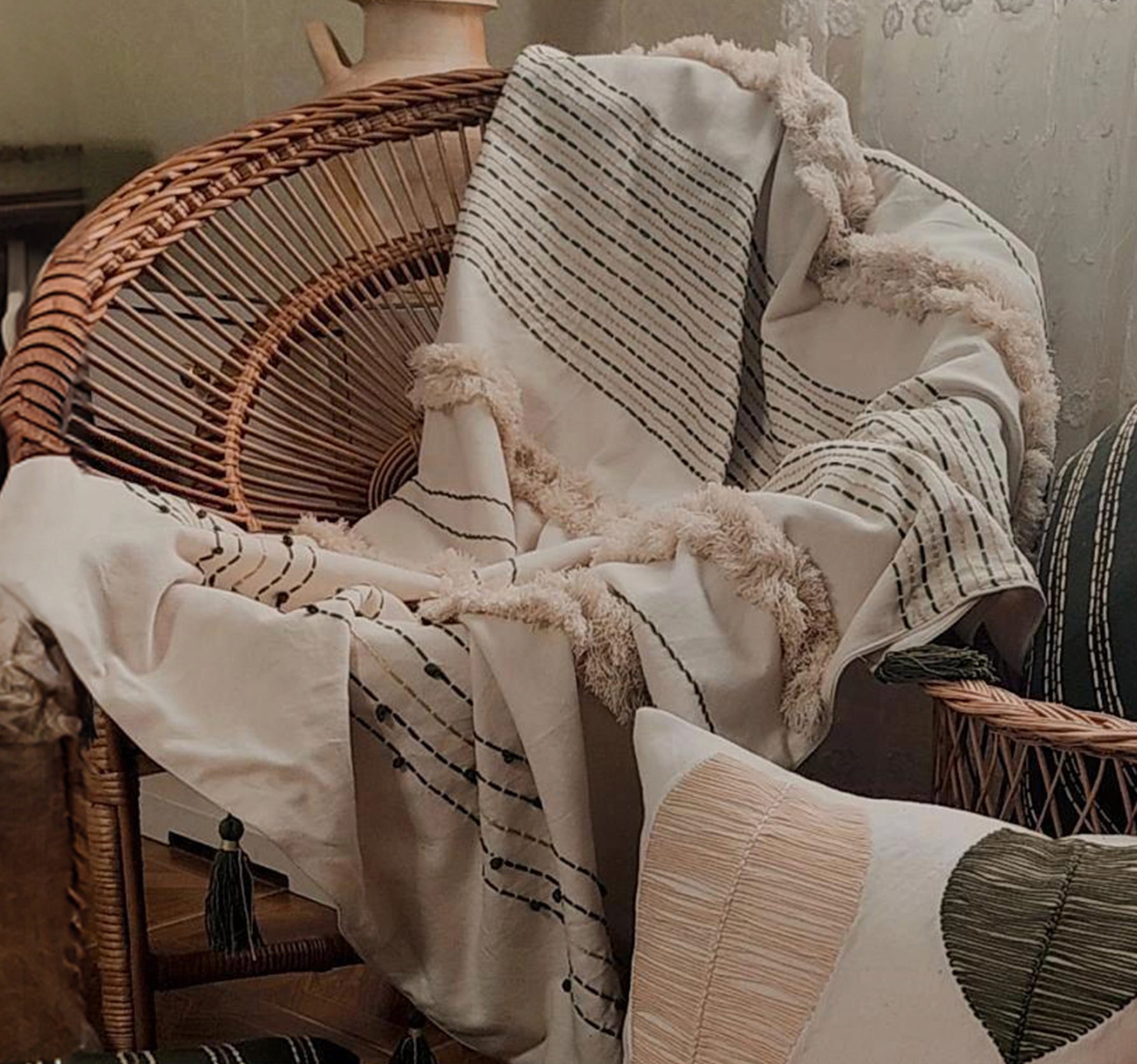 Enchanter Hand Woven Sofa Throw with a luxurious texture and an artful, cozy design.