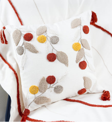 Flora Hand Woven Cushion featuring a delicate, nature-inspired design with intricate woven details