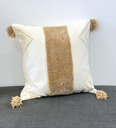 Handwoven cushion named 'Haze' with a textured fabric design.