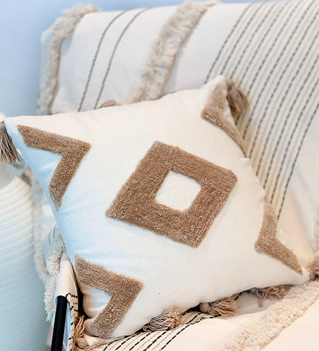 Maze Hand Woven Cushion with an intricate interlaced pattern and rich texture.