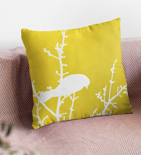 Sunbird Stylized Cushion featuring a vibrant, nature-inspired design with warm, uplifting tones.